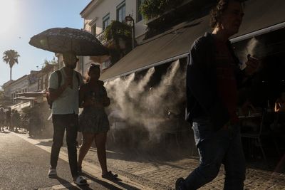 Tourist attractions close as extreme heat forces many in Europe to stay inside