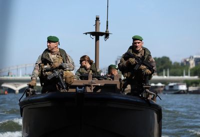 In and on the water, French troops secure the River Seine for the Paris Olympics opening ceremony