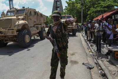 Haiti's prime minister orders gangs to drop weapons and promises to take back control of the capital