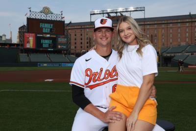 Tyler Wells And Wife Embrace Love And Joy On Field