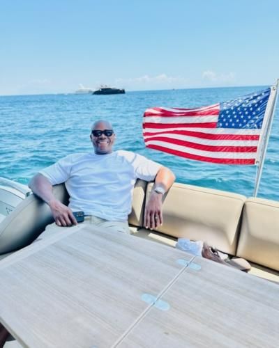 Frank Thomas Relaxing On Boat In White Tee And Shades