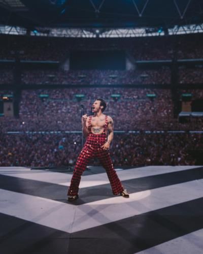 Harry Styles Stuns Fans With Vibrant Red Concert Outfit