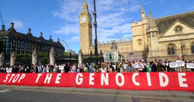 People join hands around Westminster in protest at UK arms sales to Israel