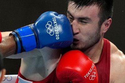 Beleaguered Olympic boxing has a new look in Paris: Gender parity, but the smallest field in decades