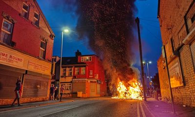 Police car turned over and vehicles set alight in disorder in Leeds