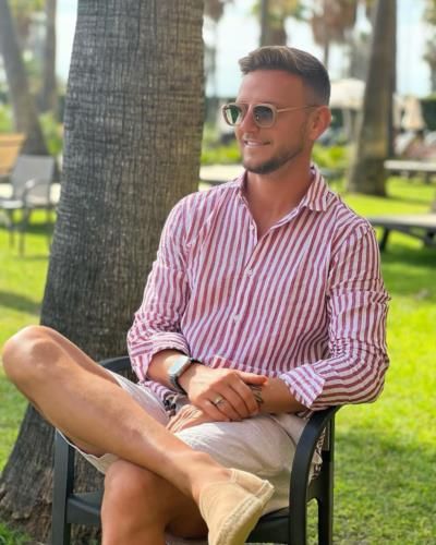 Ivan Rakitic Stylishly Poses In Red And White Striped Shirt