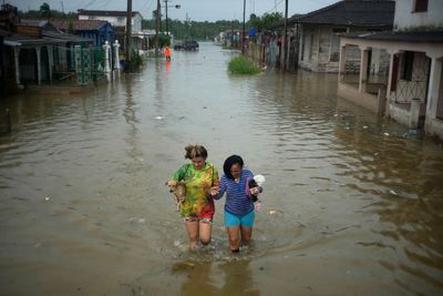 Humans caused climate change. Amid the suffering, now they must solve it