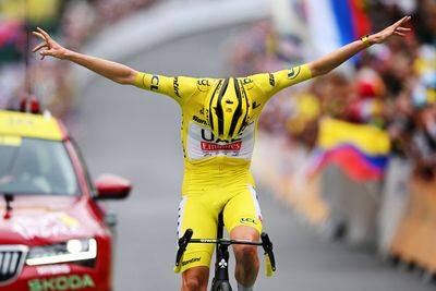 Tour de France: Tadej Pogačar takes stunning solo win on stage 19 to secure yellow jersey