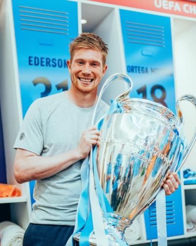 Kevin De Bruyne Celebrates Victory With Silver Trophy In Hand