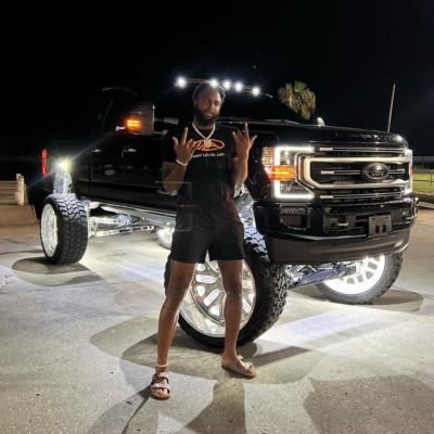 Mitchell Robinson Posing With Black Jeep In White Outfit