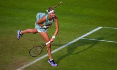 Petra Kvitova Showcasing Her Skills On The Vibrant Tennis Court