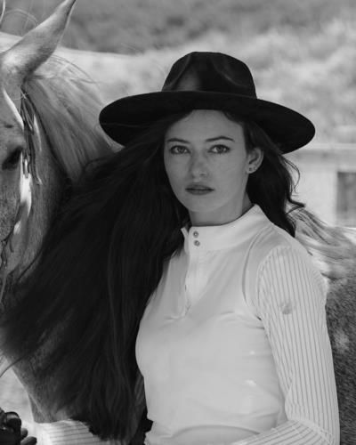 Mackenzie Foy's Elegant Pose With Horse In Black And White