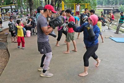 Indonesian women assert themselves with martial arts as gender-based violence remains a challenge