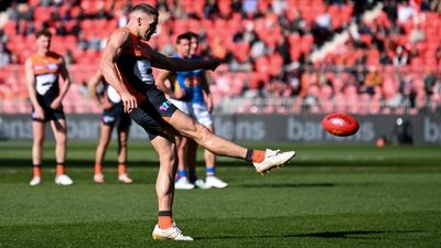 Giants crush road strugglers Suns in AFL finals push