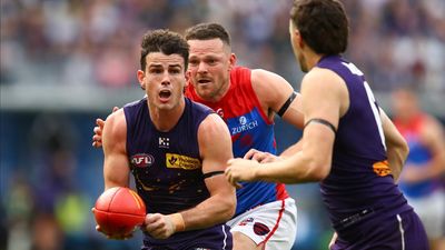 Pearce injury scare as Dockers crush Demons in Perth