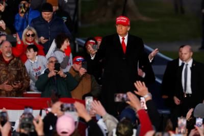 Former President Trump Jokes About His Hair During Rally