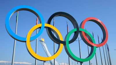 The Olympic Rings Are More Than A Trendy Tattoo For Athletes: Here’s Their History & True Meaning