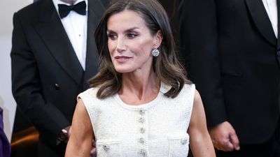 Queen Letizia's sparkling midi dress with cinched waist proves that summer sequins can be done in the daytime