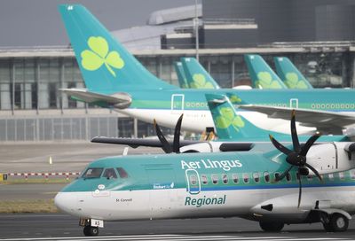 Aer Lingus pilots vote to accept a pay raise. It ends a dispute that canceled hundreds of flights