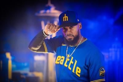 Teoscar Hernández In Blue Baseball Attire And Cap Pose