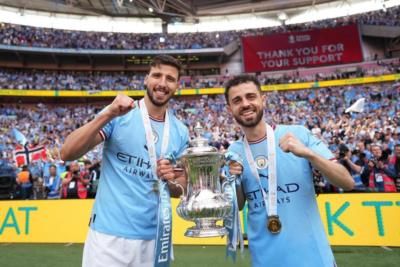 Bernardo Silva And Teammate Celebrate Victory With Medals And Trophy