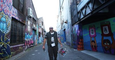 A glimpse inside Newcastle's street art scene as a freshly tagged laneway emerges