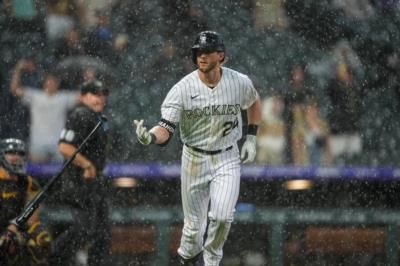 Ryan Mcmahon Showcasing His Baseball Prowess With Passion And Skill