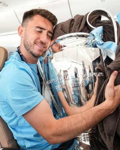 Aymeric Laporte Celebrates Victory In Stylish Blue Shirt