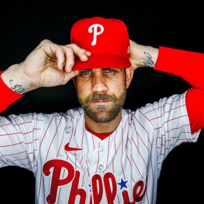 Bryce Harper In Red Baseball Attire Poses For Photos