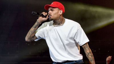 Chris Brown is being accused of brutally beating four concert goers in Texas and faces a $50 million lawsuit