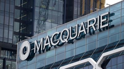 Macquarie reports subdued earnings, shares slide