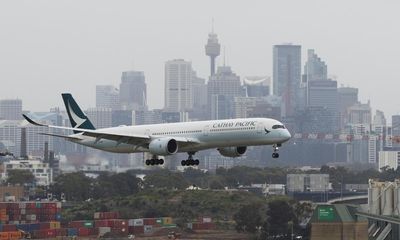 Cathay Pacific flight from Sydney delayed for a day after junior pilot allegedly failed alcohol breath test