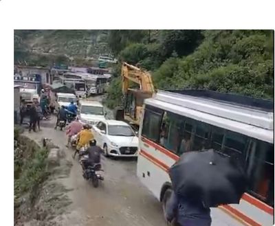 Uttarakhand Police clear debris near Gulabkoti, Pagalnala in Joshimath on Badrinath National Highway