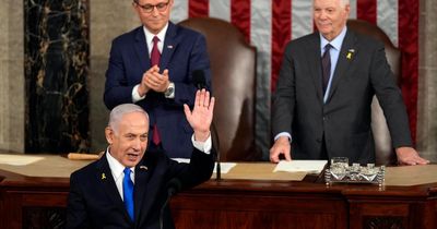 US politician holds up ‘war criminal’ sign during Benjamin Netanyahu speech