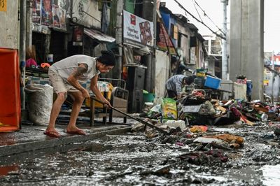 'Back To Zero': Manila Flood Victims Clean Up, Start Again