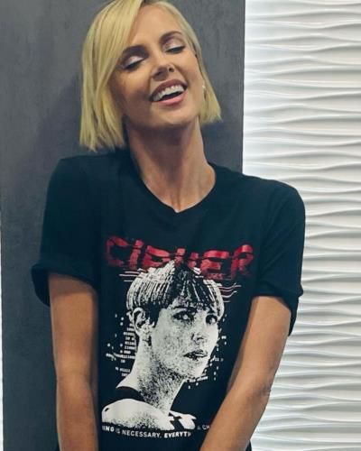 Charlize Theron: Radiant Beauty And Joy Captured In Photo