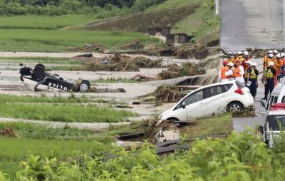 Heavy rain in northern Japan triggers floods and landslides, forcing hundreds to take shelter