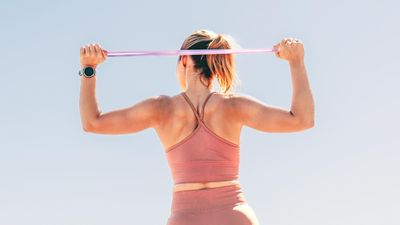 I ditched the gym and tried this back strengthening resistance band workout instead — here’s what happened to my upper body