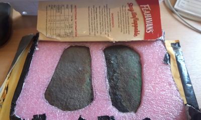 Irish museum solves mystery of bronze age axe heads delivered in porridge box