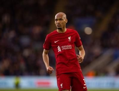 Fabinho Showcasing Skills In A Vibrant Red Football Jersey