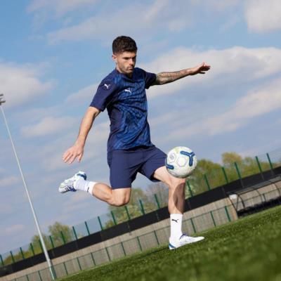 Christian Pulisic Shines In Navy Blue Jersey On Football Field