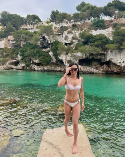 Maggie Macneil Radiates Confidence In White Bikini Under The Sun