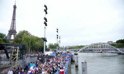 Paris 2024 Olympics opening ceremony: flying cauldron and rainy boat parade – as it happened
