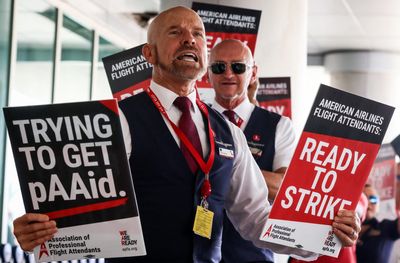 American Airlines, wary of a strike, offers to double some flight attendants’ pay