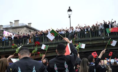 Algerians honor victims of colonial-era French crackdown at Paris Olympics ceremony