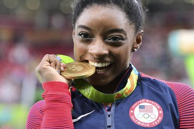 How much money do Team USA athletes make for winning Olympic gold, silver and bronze medals?