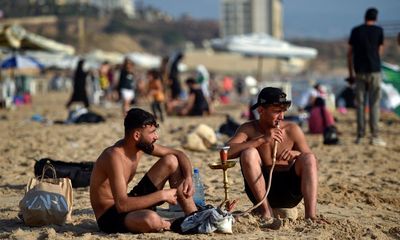 Tensions high but beaches full as Lebanon readies for war