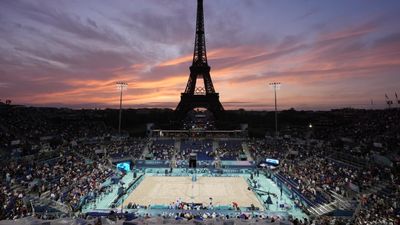 Painter Capturing Eiffel Tower in Middle of Beach Volleyball Match Was Iconic