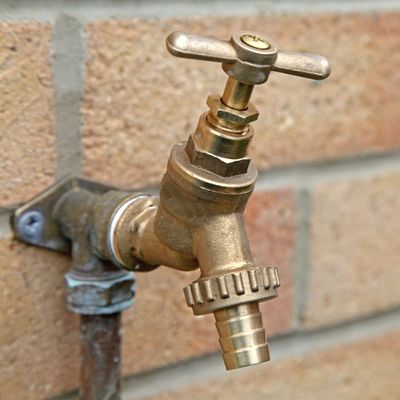 How to install an outdoor hot water tap for cleaning your patio, washing the dog, or filling the paddling pool