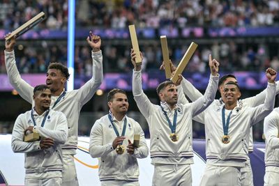 Parisian Cabaret Dancers Help Inspire France To Olympic Rugby Gold